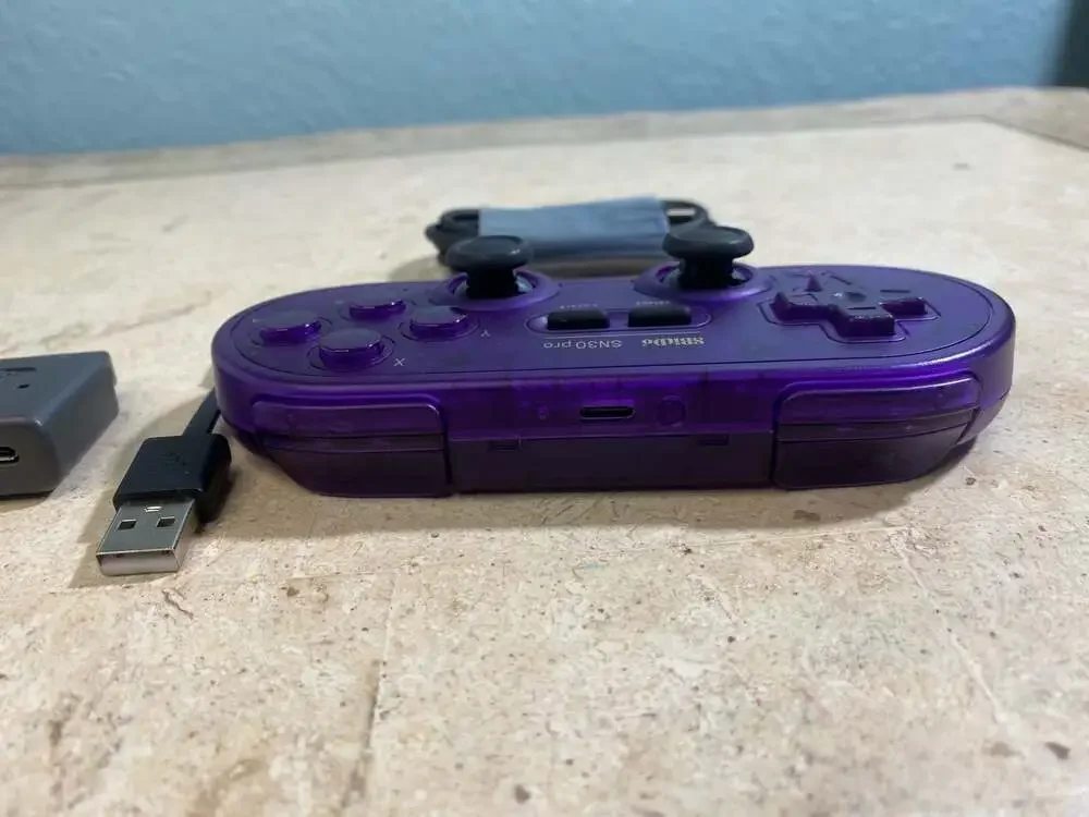 8BitDo SN30 Pro Bluetooth Gamepad and Wireless Adapter Set - Purple Transparent